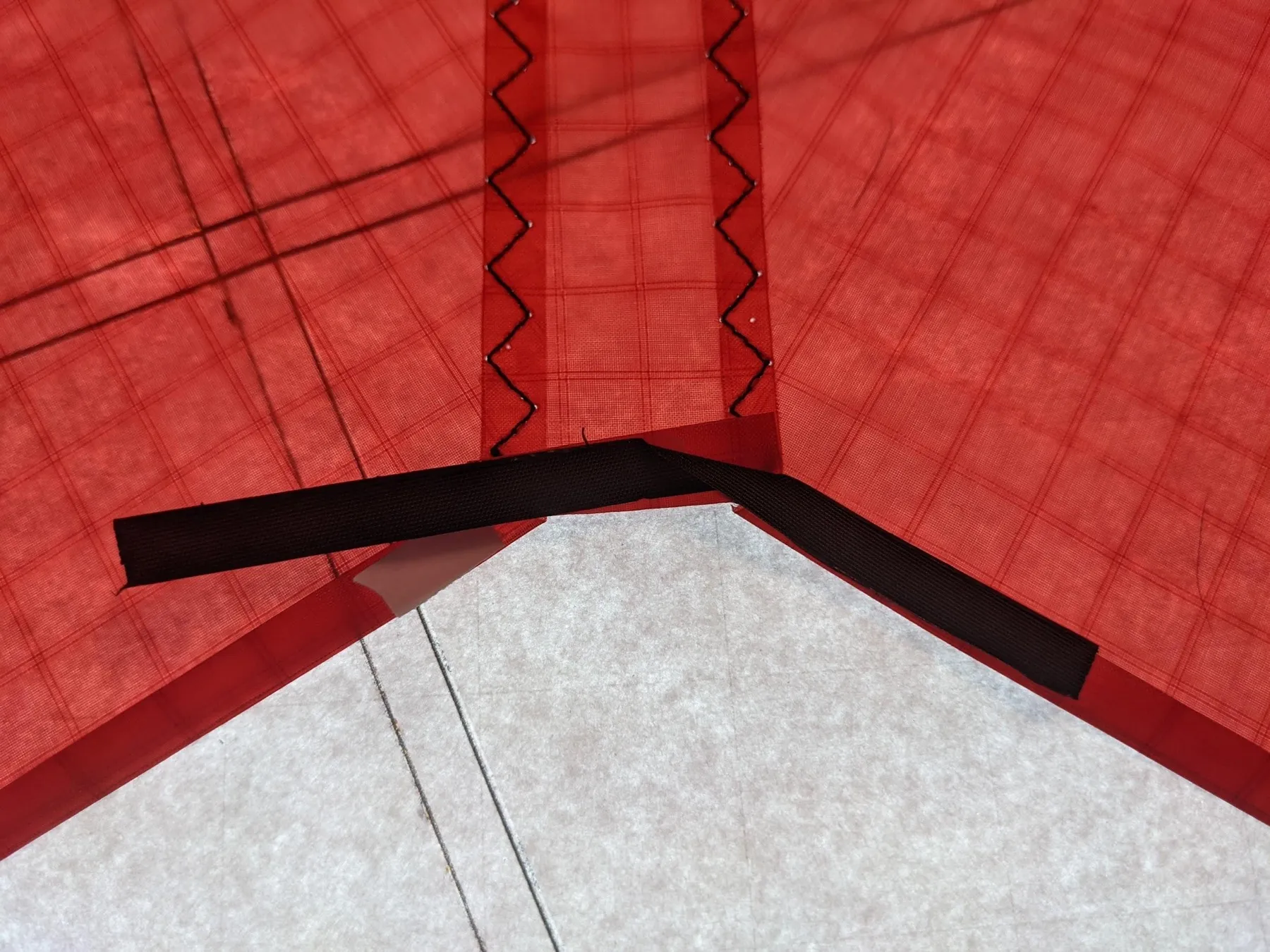 The strip folded down on one side to follow the trailing-edge angle