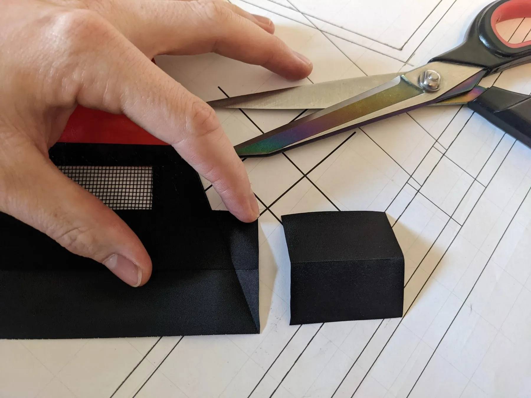 The excess Dacron cut away beyond the fold line