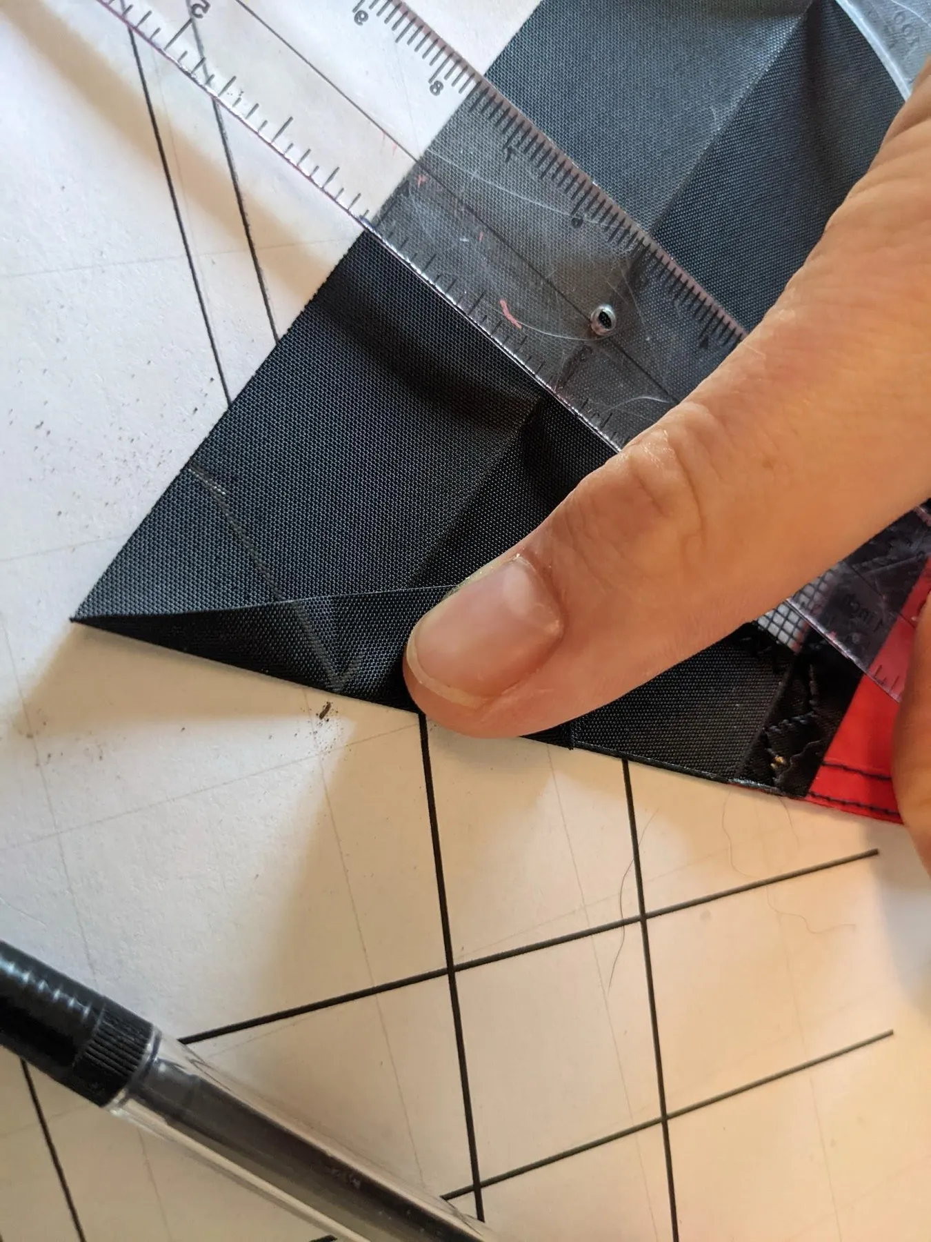 Step 7: folding the Dacron to connect the two marks