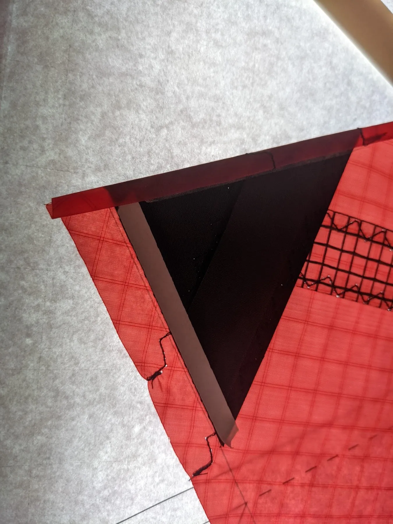 Left wing tip with the hem folded along the trailing edge