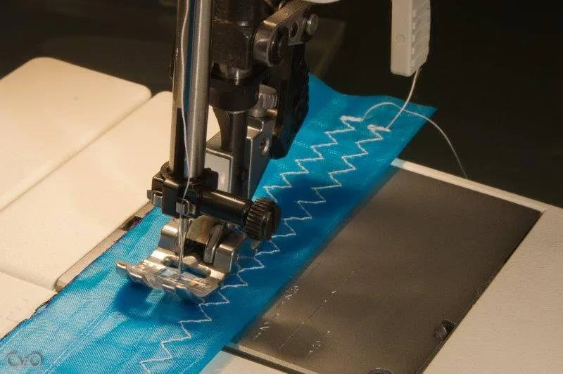 Check sewing machine settings, especially thread tension