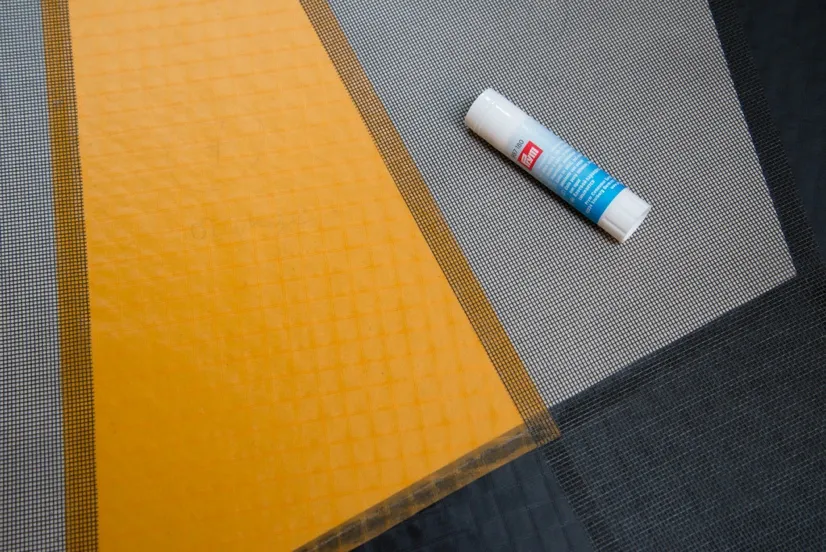Gluing the panels with a glue stick (e.g. UHU)