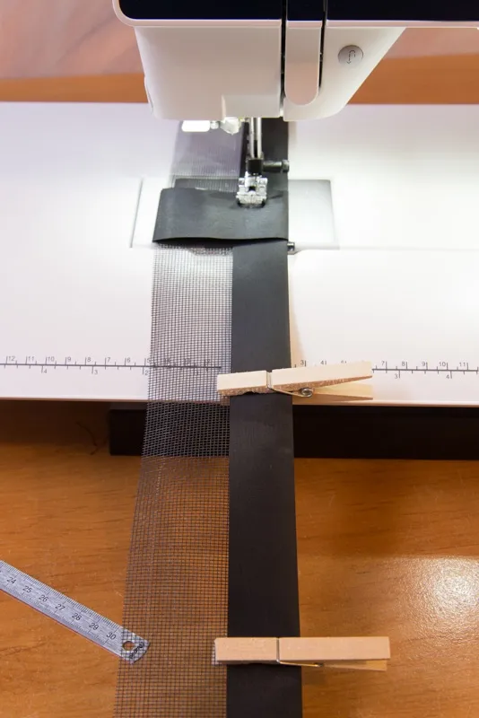 Preparing the leading edge and sewing the dacron sheath to the mesh