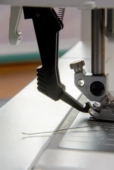 Side view of sewing machine feet