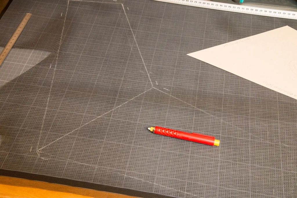 Tracing the panels on the mesh with chalk
