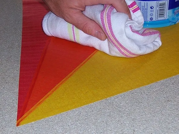 Spreading glue.