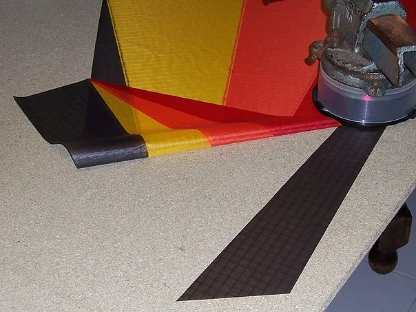 Now positioning the dark grey panels.