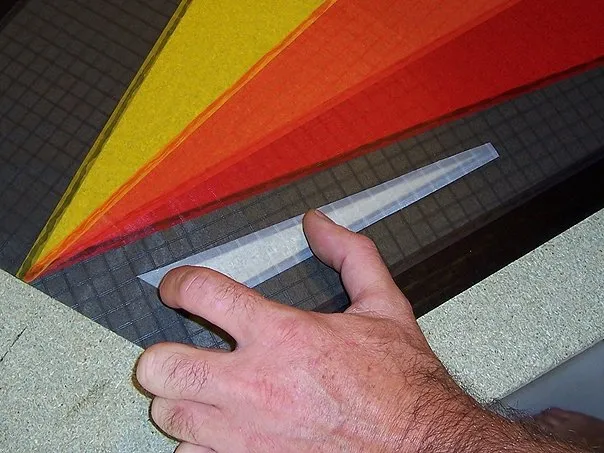 Positioning the white Icarex panel.