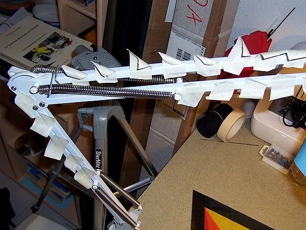 The 8 internal mesh panels of the 1st wing of the HVTD are glued together. The scotch tape holding the wing in place is removed. (Oh yes, I don't use tacks any more, tape works just as well).