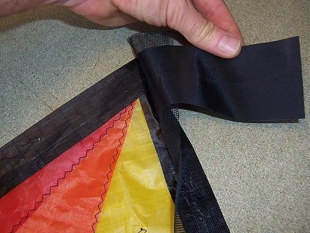 Leading edge - 2nd stage. Turning of mesh and dacron reinforcements.